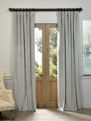 Velvet Curtains: Pictured here, you see Silver Grey Blackout Velvet Curtain -- Photo courtesy of halfpricedrapes.com.