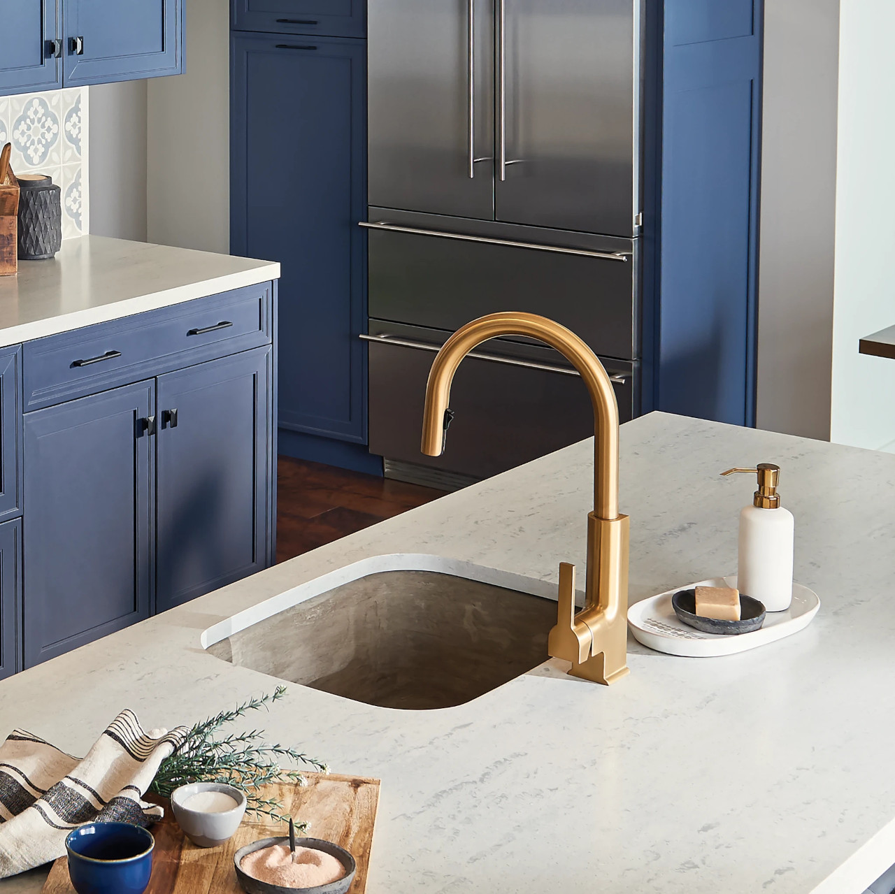 Kitchen Featuring Brushed Gold Faucet by Moen -- This faucet is available for sale at Amazon (affiliate link). Photo Courtesy of Moen.com.
