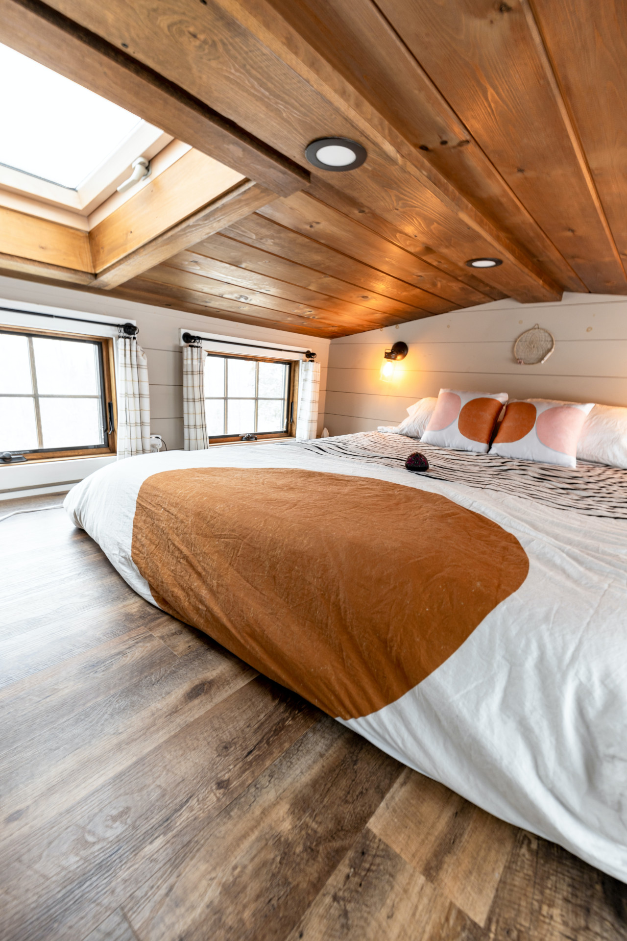 Attic Bedroom Featuring Wood Surfaces 