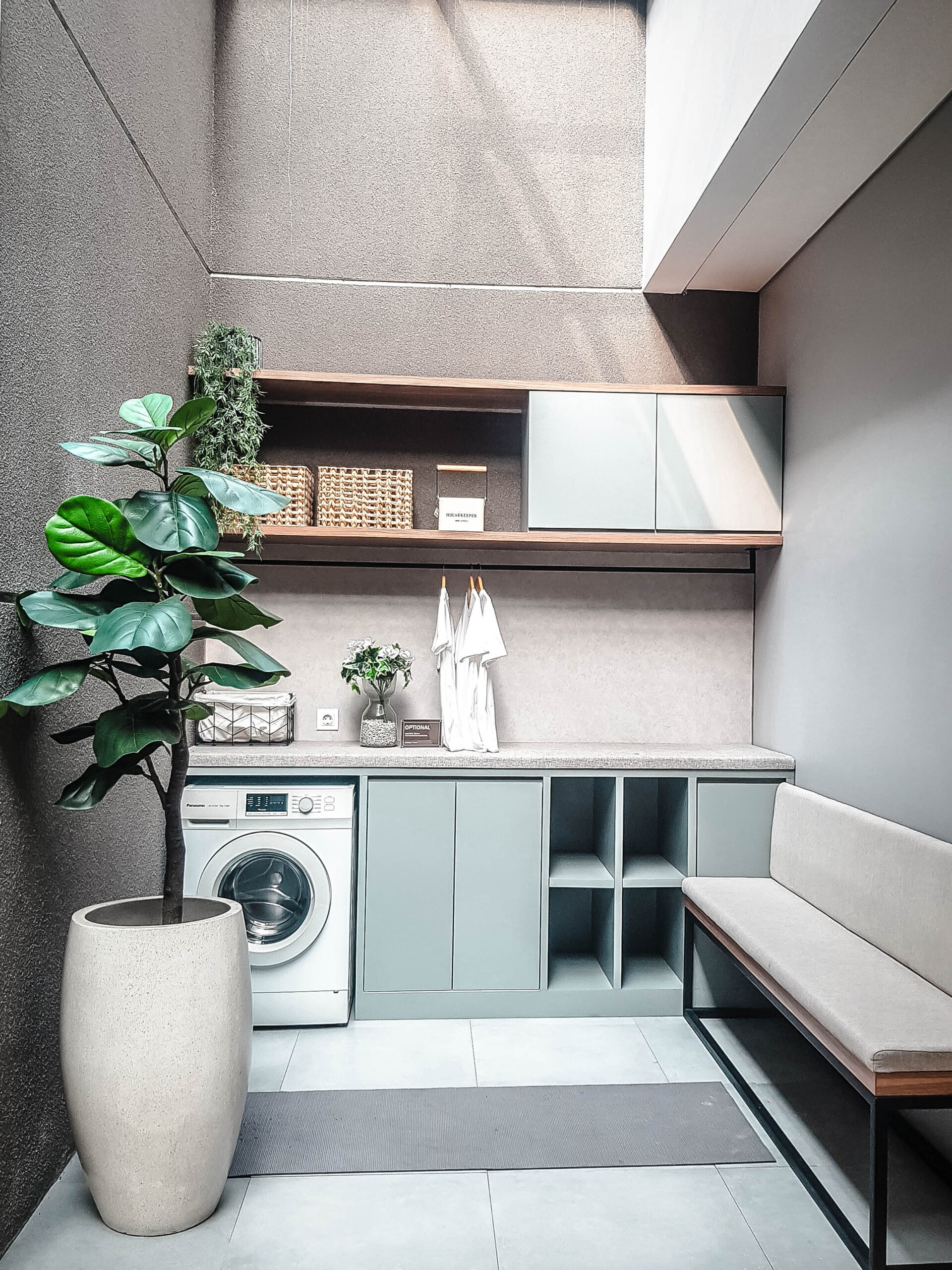 Shelving, Bench and Potted Plant in a Small Laundry Room