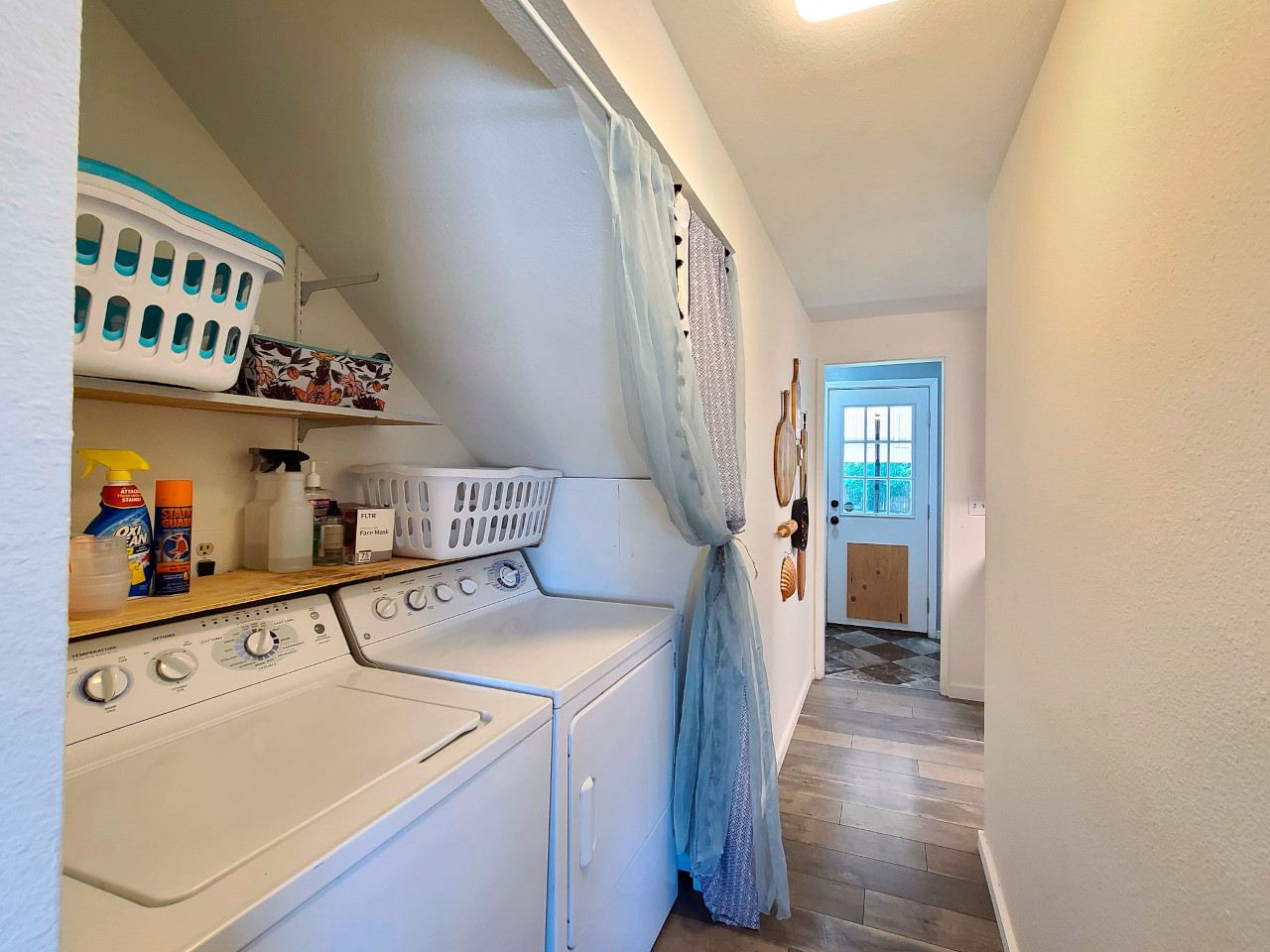 Hide Your Washing Machine and Dryer in an Out-of-the-Way Hallway Nook